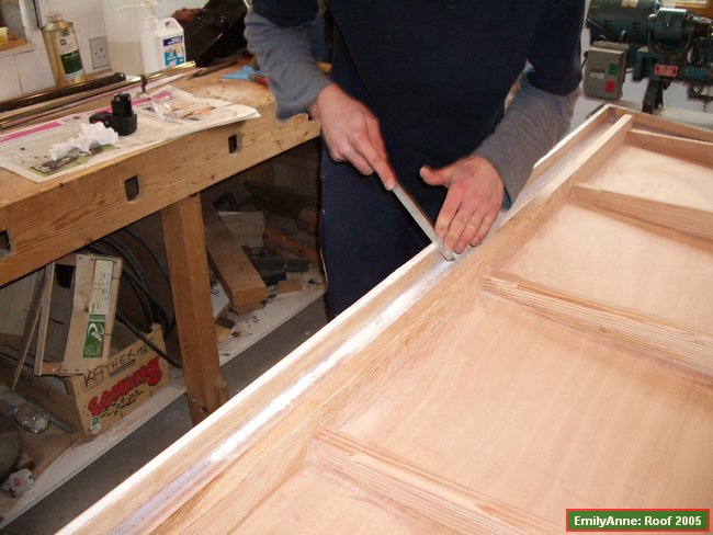 y31-rounding the rought edge of the grp with a file, ready to coat the underneath.JPG